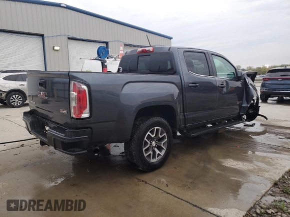 2016 GMC Canyon 4WD SLE with VIN 1GTG6CE36G1374456, listed as a Copart auction lot 52864115 with 63,892 mi miles and Salvage title. Bid and sale history available at DreamBid. Image 3.