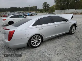 2014 Cadillac XTS Luxury z VIN 2G61M5S35E9259709, wystawiony jako Copart lot #51222425 z przebiegiem 110 081 mil mil oraz Szkody całkowita. Historia ofert i sprzedaży dostępna na DreamBid. Obrazek 3.