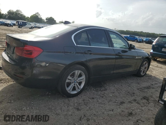 2018 BMW 3 Series 330i xDrive with VIN WBA8D9G55JNU71401, listed as a Copart auction lot 60206935 with Not provided miles and Clean title. Bid and sale history available at DreamBid. Image 3.