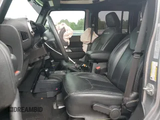 2018 Jeep Wrangler Unlimited Rubicon Recon z VIN 1C4HJWFGXJL840598, wystawiony jako Copart lot #59399595 z przebiegiem 63 298 mil mil oraz Szkoda całkowita • Salvage title. Historia ofert i sprzedaży dostępna na DreamBid. Obrazek 7.