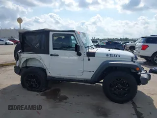 2015 Jeep Wrangler Willys Wheeler with VIN 1C4AJWAG0FL562536, listed as a IAAI auction lot 42384747 with 103,507 mi miles and . Bid and sale history available at DreamBid. Image 13.