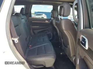 2018 Jeep Grand Cherokee Summit с VIN 1C4RJEJG7JC228316, выставлен на аукционе Copart как лот 57062435 с пробегом 99 442 миль миль и Списание • Salvage title. История ставок и продаж доступна на DreamBid. Изображение 11.