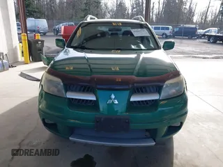 2006 Mitsubishi Outlander SE with VIN JA4LX41F46U007788, listed as a IAAI auction lot 41827737 with 175,738 mi miles. Bid and sale history available at carsss.com. Image 13.
