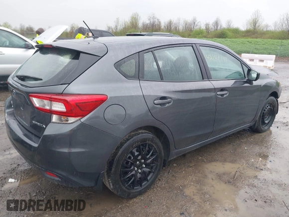 2018 Subaru Impreza with VIN 4S3GTAA67J3728185, listed as a IAAI auction lot 42140197 with 77,090 mi miles and . Bid and sale history available at DreamBid. Image 4.