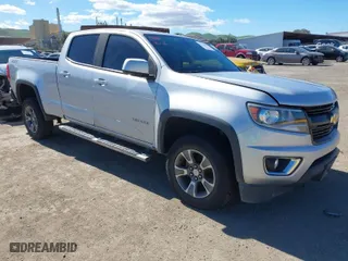 2019 Chevrolet Colorado 4WD Z71 with VIN 1GCGTDEN2K1146043, listed as a IAAI auction lot 41712002 with 84,034 mi miles. Bid and sale history available at carsss.com. Image 1.