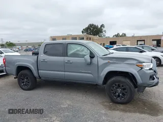 2021 Toyota Tacoma SR z VIN 3TMCZ5AN1MM422937, wystawiony jako IAAI lot #42067866 z przebiegiem 33 232 mil mil oraz . Historia ofert i sprzedaży dostępna na DreamBid. Obrazek 13.