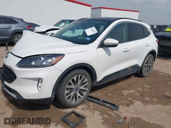2020 Ford Escape Titanium Hybrid with VIN 1FMCU0DZ9LUA54867, listed as a IAAI auction lot 42268245 with 68,974 mi miles and . Bid and sale history available at DreamBid. Image 2.