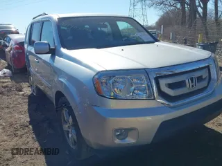 2009 Honda Pilot EX with VIN 5FNYF48479B002570, listed as a IAAI auction lot 41703942 with 146,405 mi miles. Bid and sale history available at carsss.com. Image 1.