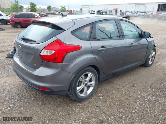 2013 Ford Focus SE with VIN 1FADP3K2XDL160734, listed as a IAAI auction lot 39953479 with 138,083 mi miles. Bid and sale history available at carsss.com. Image 4.