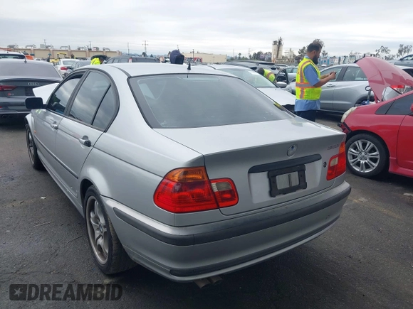2000 BMW 3 Series 323i with VIN WBAAM3341YCA87796, listed as a IAAI auction lot 41765744 with 169,051 mi miles. Bid and sale history available at carsss.com. Image 3.