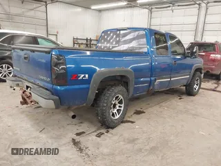 2003 Chevrolet Silverado 1500 with VIN 2GCEK19T931236982, listed as a IAAI auction lot 41178535 with 144,996 mi miles. Bid and sale history available at carsss.com. Image 4.