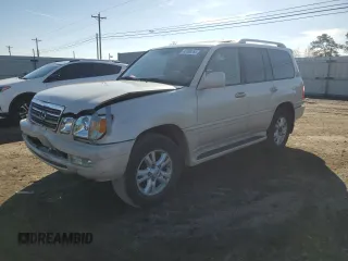 2004 Lexus LX 470 with VIN JTJHT00W943546926, listed as a Copart auction lot 42580765 with 128,629 mi miles and Salvage Title. Bid and sale history available at DreamBid. Image 1.