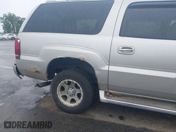 2005 Cadillac Escalade ESV z VIN 3GYFK66NX5G147854, wystawiony jako IAAI lot #42375952 z przebiegiem Nie podano mil oraz . Historia ofert i sprzedaży dostępna na DreamBid. Obrazek 12.