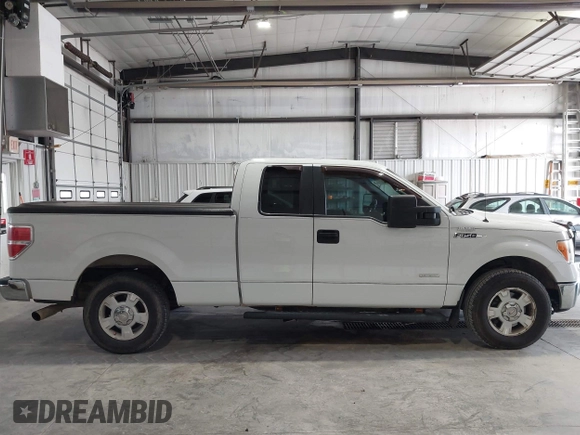 2011 Ford F-150 XL with VIN 1FTFX1CT9BFB10353, listed as a IAAI auction lot 42090388 with 469,657 mi miles. Bid and sale history available at carsss.com. Image 12.