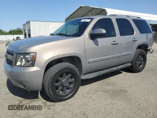 2007 Chevrolet Tahoe LTZ z VIN 1GNFC13J27R391094, wystawiony jako Copart lot #59444375 z przebiegiem 234 216 mil mil oraz Szkoda całkowita • Salvage title. Historia ofert i sprzedaży dostępna na DreamBid. Obrazek 1.