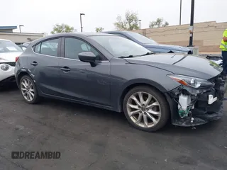 2014 Mazda 3 s Touring with VIN JM1BM1L35E1208952, listed as a IAAI auction lot 42121077 with 183,985 mi miles. Bid and sale history available at carsss.com. Image 14.