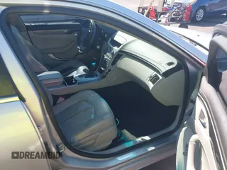 2009 Cadillac CTS RWD z VIN 1G6DU57VX90143820, wystawiony jako IAAI lot #42450086 z przebiegiem 170 656 mil mil oraz . Historia ofert i sprzedaży dostępna na DreamBid. Obrazek 5.