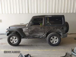 2020 Jeep Wrangler Willys z VIN 1C4GJXAG4LW237057, wystawiony jako IAAI lot #42044223 z przebiegiem 54 802 mil mil oraz . Historia ofert i sprzedaży dostępna na DreamBid. Obrazek 15.