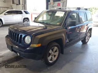 2014 Jeep Patriot Latitude with VIN 1C4NJRFB3ED863519, listed as a IAAI auction lot 42670843 with 220,920 mi miles and . Bid and sale history available at DreamBid. Image 2.