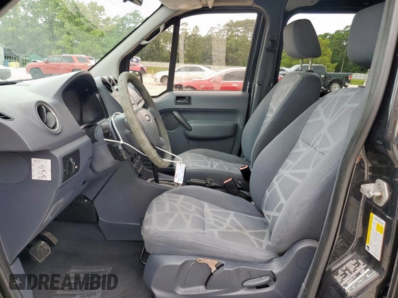 2012 Ford Transit Connect XLT z VIN NM0LS6BN6CT119710, wystawiony jako Copart lot #61487795 z przebiegiem 182 799 mil mil oraz Szkoda całkowita • Salvage title. Historia ofert i sprzedaży dostępna na DreamBid. Obrazek 7.