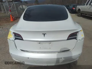 2020 Tesla Model 3 Standard Range Plus with VIN 5YJ3E1EA0LF597839, listed as a IAAI auction lot 41639219 with 49,220 mi miles. Bid and sale history available at carsss.com. Image 17.