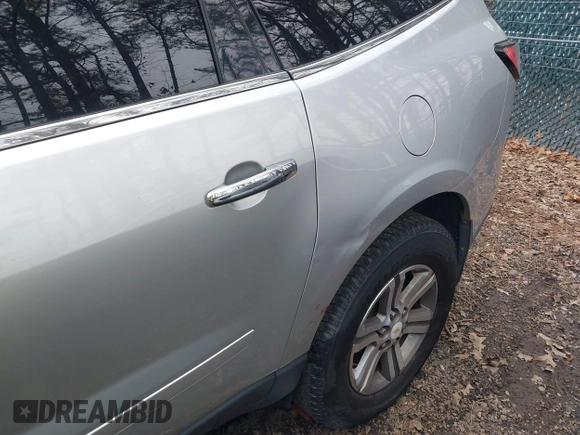 2015 Chevrolet Traverse LT with VIN 1GNKVHKD9FJ122097, listed as a IAAI auction lot 41794833 with 170,314 mi miles and . Bid and sale history available at DreamBid. Image 6.