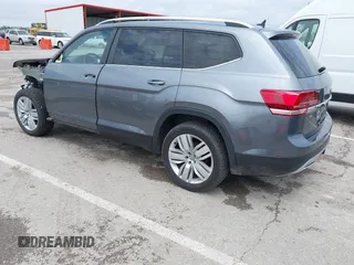 2019 Volkswagen Atlas SE z VIN 1V2WR2CAXKC611864, wystawiony jako IAAI lot #42151795 z przebiegiem 90 178 mil mil oraz . Historia ofert i sprzedaży dostępna na DreamBid. Obrazek 3.