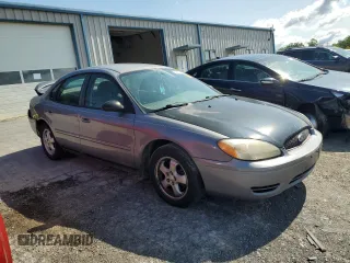 2006 Ford Taurus SE with VIN 1FAFP53U36A262525, listed as a Copart auction lot 86797374 with 179,508 mi miles and Salvage title. Bid and sale history available at DreamBid. Image 4.
