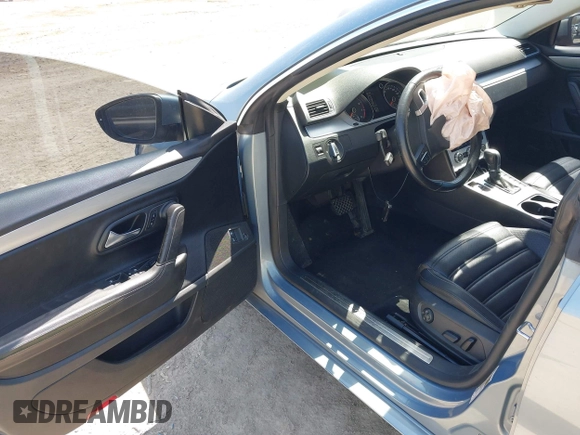 2013 Volkswagen CC Sport with VIN WVWBN7AN6DE536425, listed as a IAAI auction lot 42091513 with 180,753 mi miles. Bid and sale history available at carsss.com. Image 9.