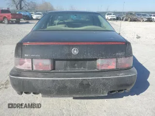 1996 Cadillac Seville Touring STS z VIN 1G6KY5299TU801228, wystawiony jako Copart lot #47304045 z przebiegiem Nie podano mil oraz Szkoda całkowita • Salvage title. Historia ofert i sprzedaży dostępna na DreamBid. Obrazek 6.