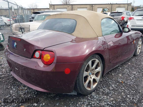 2004 BMW Z4 2.5i with VIN 4USBT33544LS50607, listed as a IAAI auction lot 42055929 with 156,585 mi miles. Bid and sale history available at carsss.com. Image 4.