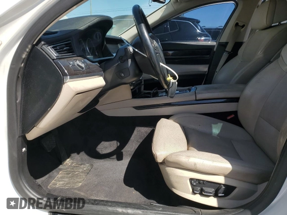 2011 BMW 7 Series 740i with VIN WBAKA4C50BC612878, listed as a Copart auction lot 52035635 with 192,248 mi miles and Salvage Title. Bid and sale history available at carsss.com. Image 7.