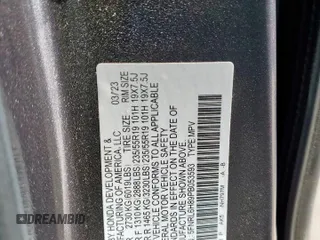 2023 Honda Odyssey Touring with VIN 5FNRL6H89PB053593, listed as a Copart auction lot 64836685 with 26,568 mi miles and Salvage title. Bid and sale history available at DreamBid. Image 12.