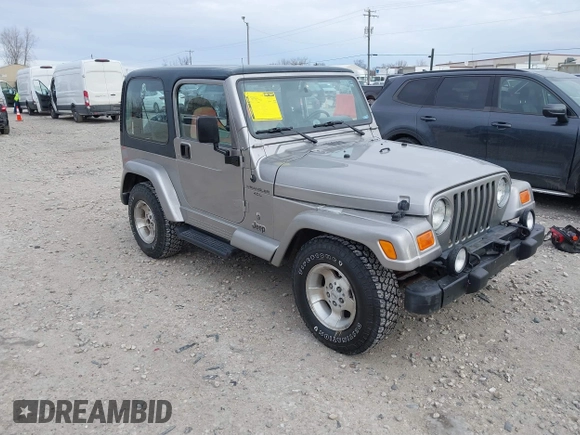 2001 Jeep Wrangler Sport z VIN 1J4FA49S31P349269, wystawiony jako IAAI lot #41427014 z przebiegiem 112 421 mil mil oraz . Historia ofert i sprzedaży dostępna na DreamBid. Obrazek 1.