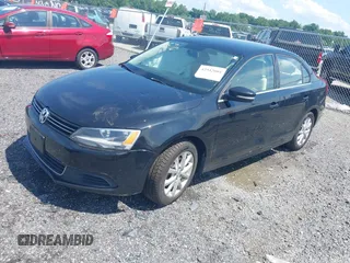 2014 Volkswagen Jetta SE with VIN 3VWD17AJ4EM429576, listed as a IAAI auction lot 42542604 with 142,313 mi miles and . Bid and sale history available at DreamBid. Image 17.