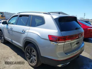 2024 Volkswagen Atlas SE with VIN 1V2JR2CA2RC518633, listed as a IAAI auction lot 41773560 with 22,386 mi miles and . Bid and sale history available at DreamBid. Image 3.