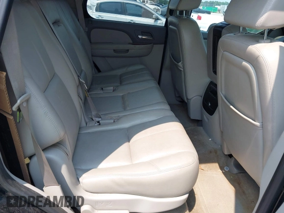 2007 Chevrolet Tahoe LTZ with VIN 1GNFC13007R111180, listed as a IAAI auction lot 42381749 with 126,472 mi miles and . Bid and sale history available at DreamBid. Image 8.