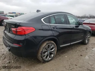 2015 BMW X4 xDrive28i with VIN 5UXXW3C58F0M87154, listed as a Copart auction lot 69211092 with 147,960 mi miles. Bid and sale history available at carsss.com. Image 3.