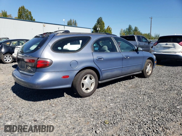 1999 Ford Taurus SE Standard with VIN 1FAFP58U9XG271897, listed as a Copart auction lot 73048784 with 190,518 mi miles and Salvage title. Bid and sale history available at DreamBid. Image 3.