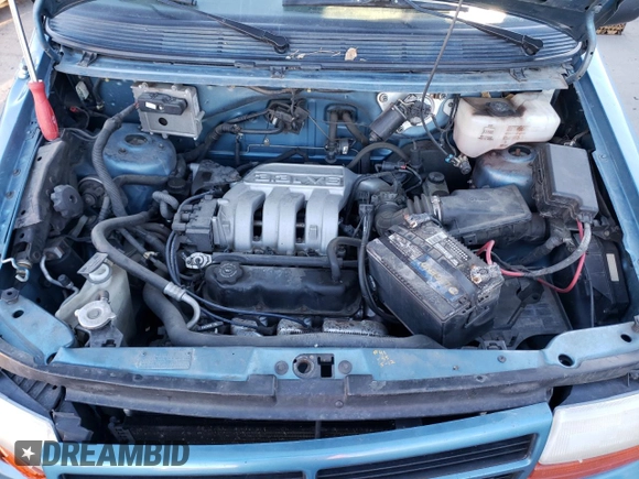 1994 Dodge Caravan Grand SE z VIN 1B4GH44R1RX330819, wystawiony jako Copart lot #83548684 z przebiegiem 187 408 mil mil oraz Szkody całkowita. Historia ofert i sprzedaży dostępna na DreamBid. Obrazek 12.