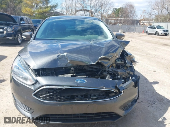 2018 Ford Focus SE with VIN 1FADP3F26JL249433, listed as a IAAI auction lot 41871395 with 131,357 mi miles. Bid and sale history available at carsss.com. Image 12.