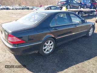 2006 Mercedes-Benz S 430 with VIN WDBNG83JX6A470123, listed as a IAAI auction lot 41876932 with 153,088 mi miles and . Bid and sale history available at carsss.com. Image 4.