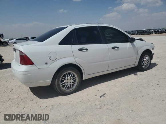 2007 Ford Focus S z VIN 1FAFP34N27W186716, wystawiony jako Copart lot #54894055 z przebiegiem 86 305 mil mil oraz Szkoda całkowita • Salvage title. Historia ofert i sprzedaży dostępna na DreamBid. Obrazek 3.