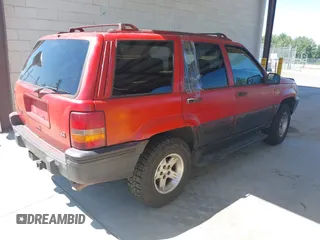 1995 Jeep Grand Cherokee Laredo with VIN 1J4GZ58Y6SC508349, listed as a IAAI auction lot 42630804 with 223,519 mi miles and . Bid and sale history available at DreamBid. Image 4.
