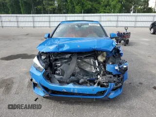 2021 BMW 2 Series 228i with VIN WBA53AK00M7J43699, listed as a Copart auction lot 55928355 with 86,544 mi miles and Salvage title. Bid and sale history available at DreamBid. Image 5.