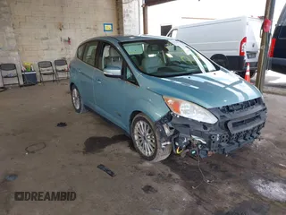 2013 Ford C-Max SEL z VIN 1FADP5CU3DL555110, wystawiony jako IAAI lot #42010076 z przebiegiem 121 234 mil mil oraz . Historia ofert i sprzedaży dostępna na DreamBid. Obrazek 1.