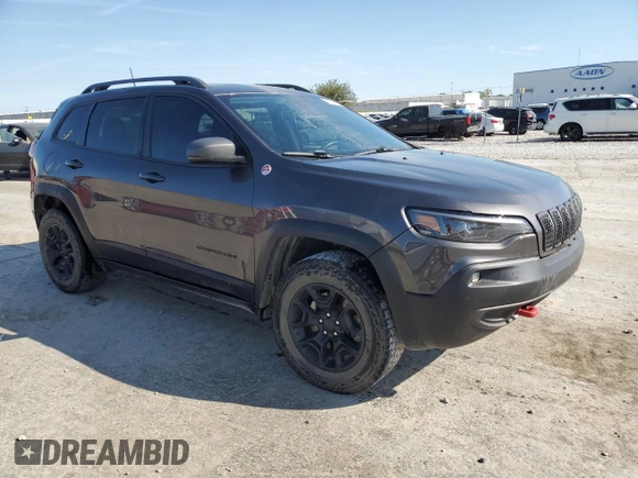 2019 Jeep Cherokee Trailhawk Elite with VIN 1C4PJMBX8KD107404, listed as a Copart auction lot 70588724 with 112,540 mi miles and Salvage Title. Bid and sale history available at carsss.com. Image 4.