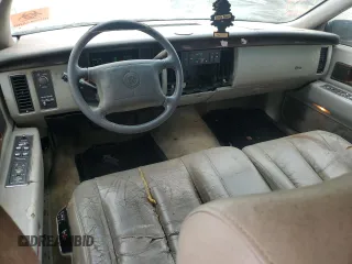1996 Cadillac Fleetwood z VIN 1G6DW52P7TR710605, wystawiony jako Copart lot #51814605 z przebiegiem 280 654 mil mil oraz Nie do naprawy • Non repairable. Historia ofert i sprzedaży dostępna na DreamBid. Obrazek 8.