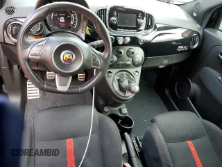 2017 FIAT 500 Abarth z VIN 3C3CFFFH6HT526325, wystawiony jako Copart lot #79726074 z przebiegiem 77 682 mil mil oraz Szkody całkowita. Historia ofert i sprzedaży dostępna na DreamBid. Obrazek 8.