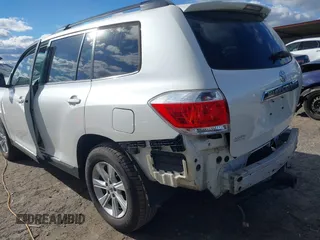 2013 Toyota Highlander with VIN 5TDZA3EH2DS038661, listed as a IAAI auction lot 40925630 with 143,773 mi miles and . Bid and sale history available at DreamBid. Image 3.